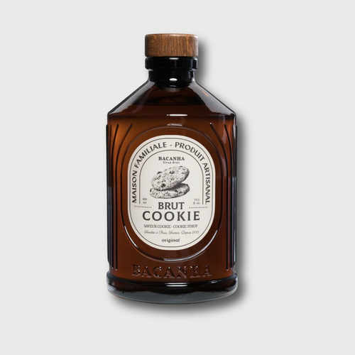 Brown bottle with wooden cap on a white background